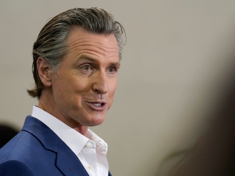 FILE - California Gov. Gavin Newsom speaks at a news conference in Sacramento, Calif., March 16, 2023. FILE - California Gov. Gavin Newsom speaks at a news conference in Sacramento, Calif., March 16, 2023.