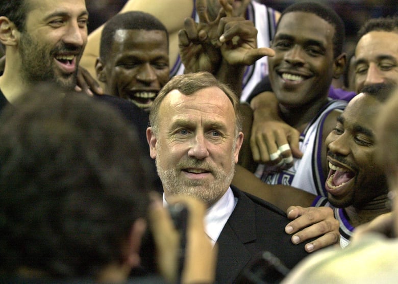 Sacramento Kings coach Rick Adelman, center, is mobbed by his players at Arco Arena in Sacramento, Calif., after the Kings defeated the Orlando Magic 112 -100, marking Adelman's 500th career coaching victory, Tuesday, Dec. 11, 2001. Sacramento Kings coach Rick Adelman, center, is mobbed by his players at Arco Arena in Sacramento, Calif., after the Kings defeated the Orlando Magic 112 -100, marking Adelman's 500th career coaching victory, Tuesday, Dec. 11, 2001.