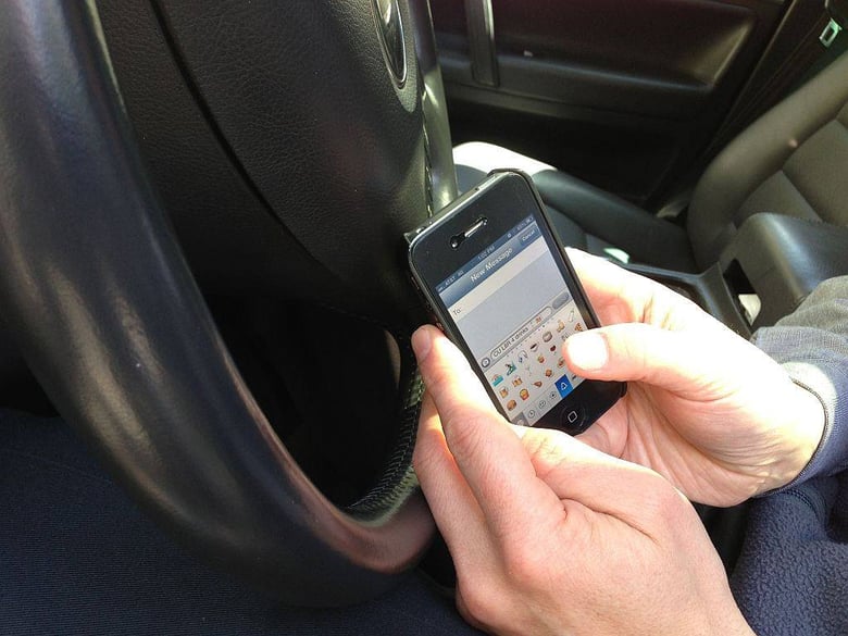 Is it illegal to have a phone holder on my car windscreen?